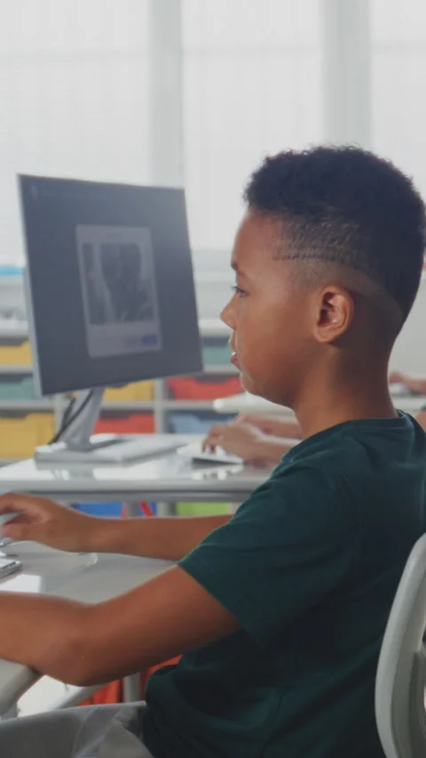 Elementary School Children Using Computers, Creating Illustrations in AI Image Stock Footage 317162441