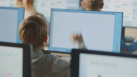 Elementary School Class: Teacher Uses Digital Whiteboard, Explain Lesson to Kids Stock Footage 119360464
