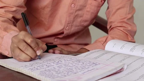 In Elementary School Class:  Writes in Exercise Notebook, Vidéo 141850310