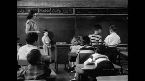 Elementary School Classroom During Lesson With Young Female Teacher Stock Footage 157789096