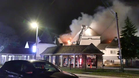 Elementary school on fire at night Stock Footage 139657515