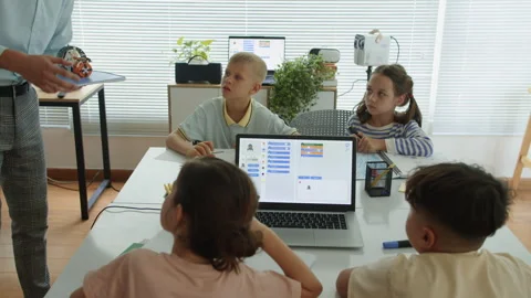 Elementary School Kids Learning New Topic with Teacher at IT Class Stock Footage 280535789