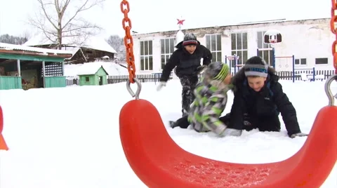 Elementary School Kids Playing on the School Yard. Winter Stock Footage 65512831