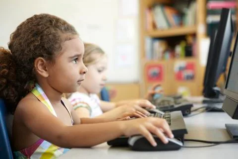 Elementary School Pupil In Computer Class Stock Photos