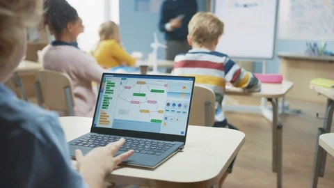 Elementary School Science Class: Little Boy Uses Laptop Programming Software Stock Footage 119056726