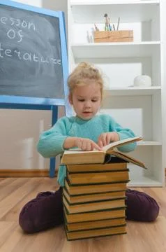 Elementary school student with a book Photos