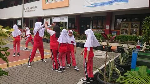 Elementary school student enjoy doing sport activity Stock Photos