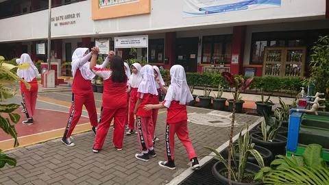 Elementary school student enjoy doing sport activity Stock Photos