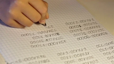 Elementary school student hand doing homework Stock Footage 75417715