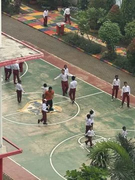 Elementary school students are gathering for ceremony in the morning at Jakarta Stock Photos