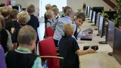 Elementary school students in a computer class Stock Footage