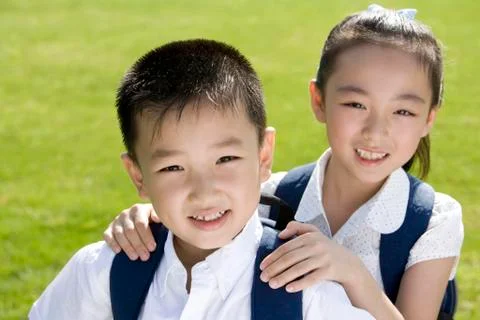 Elementary school students in the park Stock Photos