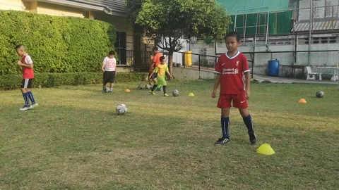 Elementary school students soccer practice Stock Footage 160112421