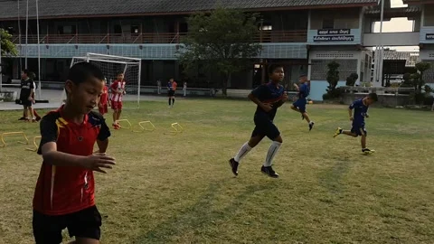 Elementary school students soccer practice Stock Footage 160112473