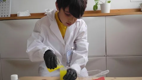 Elementary student practicing chemical reaction at science class Stock Footage 280684832