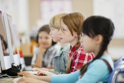Elementary students in computer lab Stock Photos