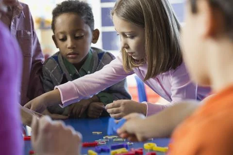 Elementary students learning the alphabet in school Stock Photos