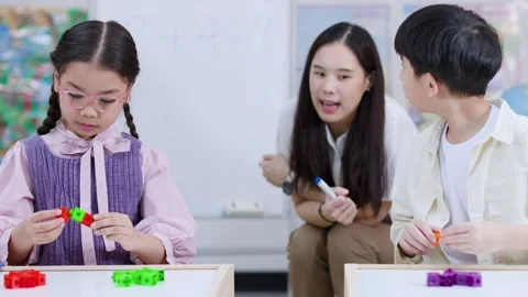 Elementary Students Learning Math With Colorful Counting Blocks Stock Footage 325838862