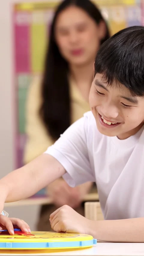 Elementary Students Learning Time With Colorful Classroom Clock Stock Footage 330995431