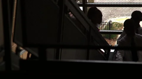 Elementary Students Walking Down School Hallway Stock-Footage 134587617