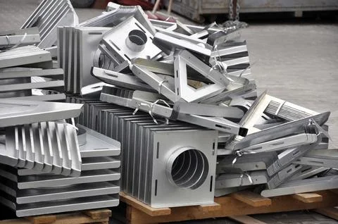 Elements and parts made of galvanized sheet for various ventilation systems. Stockfoto's