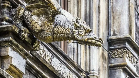 Elements of architecture in the Gothic style on the background of dramatic sky. Stock Footage 153967601