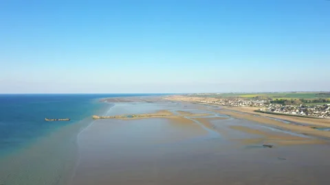 The elements of the artificial harbor on the beach of Gold beach Stock Footage 164204296