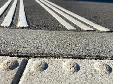 Elements of blind persons street navigation on a city street Photos