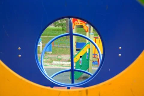 Elements of a children's playground with a round window.	 Stock Photos