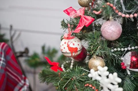 Elements of a Christmas tree with decorations in close-up 3750. Stock Photos