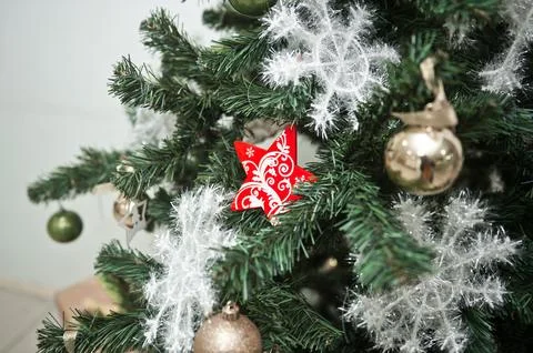 Elements of a Christmas tree with decorations in close-up 3754. Stock Photos