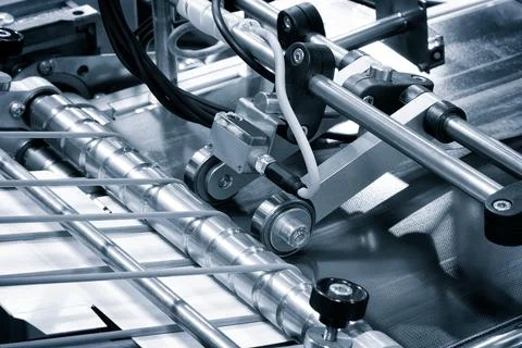 Elements of corton boxes are collected in stack. Conveyor line for the produc Foto stock