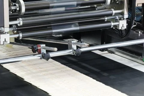 Elements of corton boxes collected in stack. Conveyor line for production of  Stock Photos