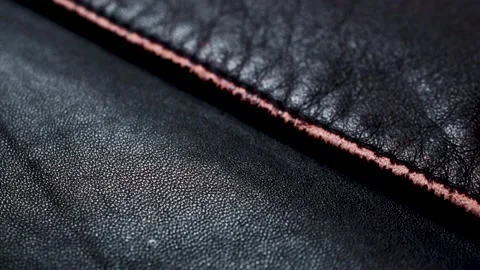 Elements on a dark red brown leather jacket. Closeup leather texture for fashion Stock Footage 208110768