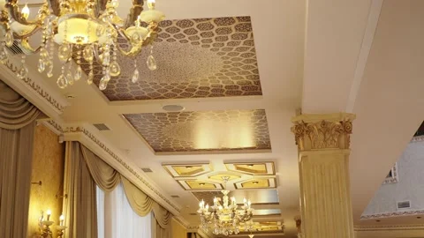 Elements of a decorated ceiling with beautiful chandeliers in the dance hall. Stock Footage 231094151