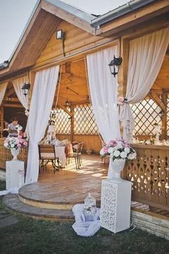 Elements of decoration of the festive hall in the form of bouquets of flow Stock Photos