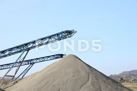 Elements of equipment for the extraction and sorting of rubble. Production of Stock Photos