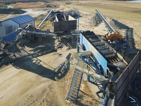 Elements of equipment for the extraction and sorting of rubble. Production of Stock Photos