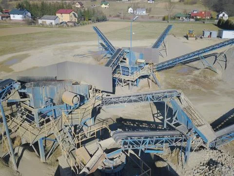 Elements of equipment for the extraction and sorting of rubble. Production of Stock Photos