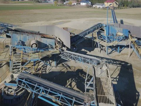 Elements of equipment for the extraction and sorting of rubble. Production of Stock Photos