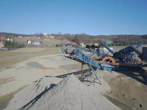 Elements of equipment for the extraction and sorting of rubble. Production of Stock Photos