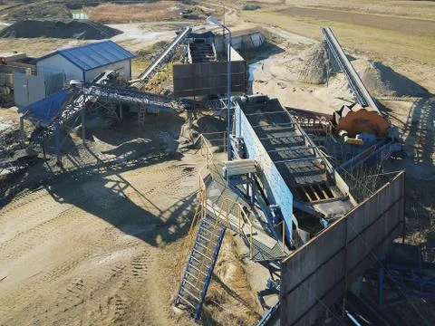 Elements of equipment for the extraction and sorting of rubble. Production of Stock Photos