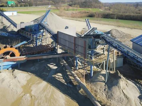 Elements of equipment for the extraction and sorting of rubble. Production of Stock Photos