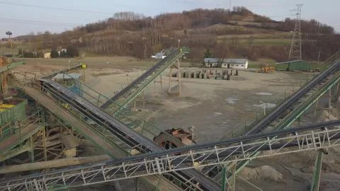 Elements of equipment for the extraction and sorting of rubble. Production of Stock Photos