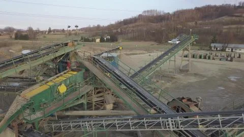 Elements of equipment for the extraction and sorting of rubble. Production of Stock Photos