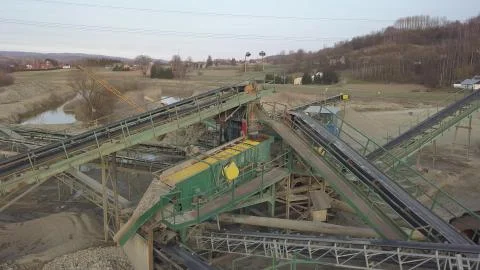 Elements of equipment for the extraction and sorting of rubble. Production of Stock Photos