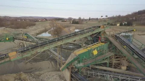 Elements of equipment for the extraction and sorting of rubble. Production of Stock Photos