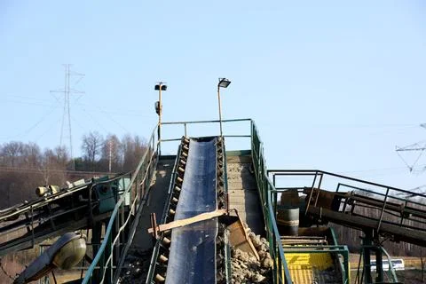 Elements of equipment for the extraction and sorting of rubble. Production .. Stock Photos