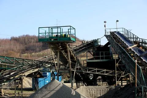 Elements of equipment for the extraction and sorting of rubble. Production .. Stock Photos