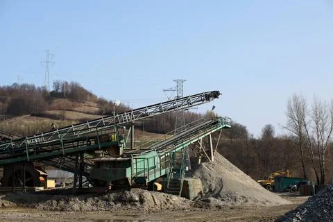 Elements of equipment for the extraction and sorting of rubble. Production .. Stock Photos